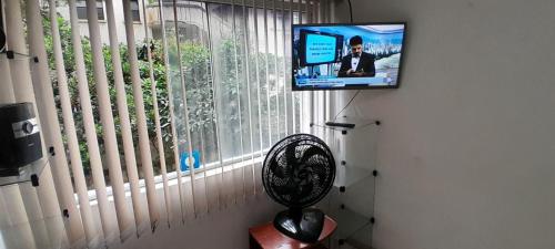 Телевизия и/или развлекателен център в Apartamento Na Ilha Porchat