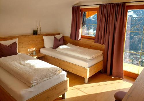 Una cama o camas en una habitación de Riedlhof