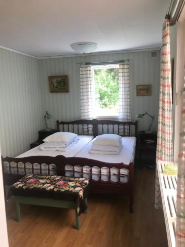 Ένα ή περισσότερα κρεβάτια σε δωμάτιο στο Family house 50 meters to the ocean