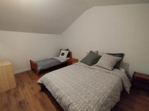 Ein Bett oder Betten in einem Zimmer der Unterkunft Gîte de la Treille
