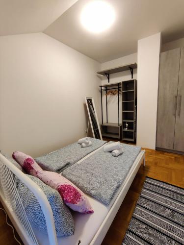 Кровать или кровати в номере Dalija Apartment
