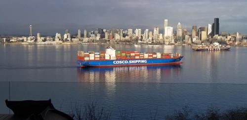 a large container ship in the water with a city at 180 degree, unobstructed bluff view! in Seattle