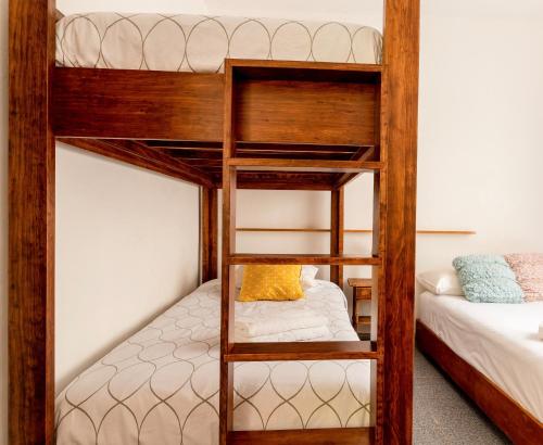 Giường trong phòng chung tại Villa Coyoacan