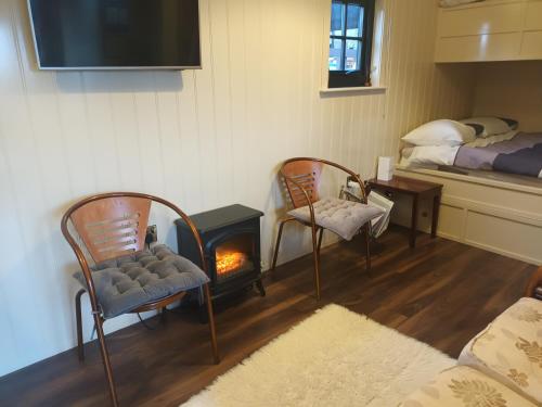 Postel nebo postele na pokoji v ubytování Rathgillen Cabin