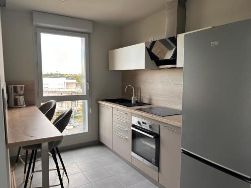 Dapur atau dapur kecil di Appartement T2 proche d'Airbus et centre ville de Toulouse