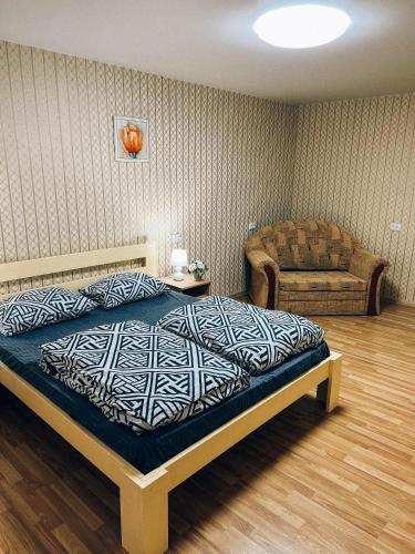 Postelja oz. postelje v sobi nastanitve Standart-Однокімнатна квартира біля басейну