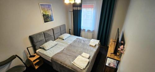 Ένα ή περισσότερα κρεβάτια σε δωμάτιο στο Miami Vice apartament by Karl