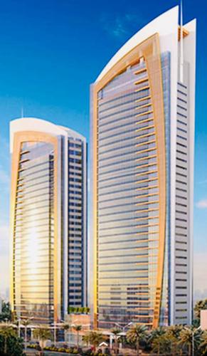 two tall buildings are next to each other at Luxury apartments - Damac tower in Riyadh