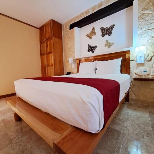 Katil atau katil-katil dalam bilik di Cancun International Suites