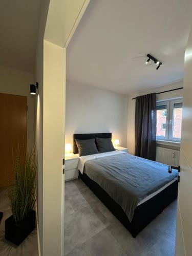 Ένα ή περισσότερα κρεβάτια σε δωμάτιο στο Apartment Laurier