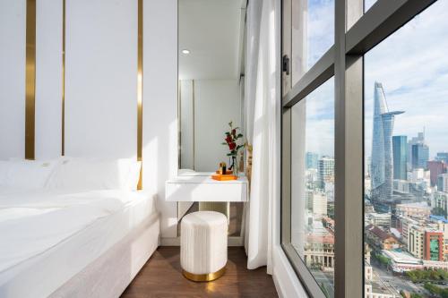 a white bedroom with a view of the city at 2Br-Top Fl-Amazing View-Hana Apt in Ho Chi Minh City