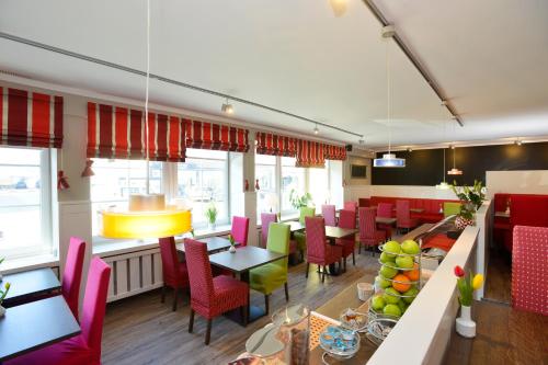 Posezení v ubytování Hotel Dünenburg
