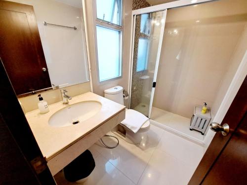 a bathroom with a sink and a shower and a toilet at 6C-Short-term rental allowed-2BRs Downtown Bangkok in Makkasan