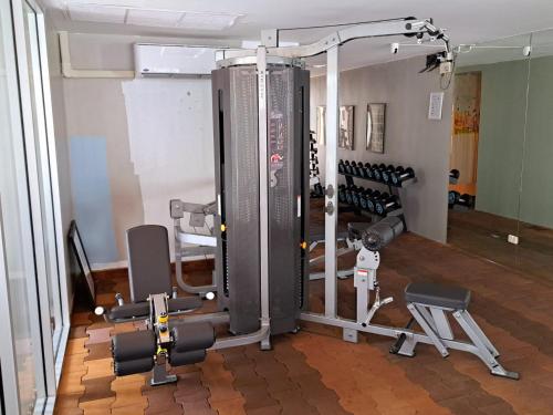 a gym with a bunch of equipment in a room at 6C-Short-term rental allowed-2BRs Downtown Bangkok in Makkasan