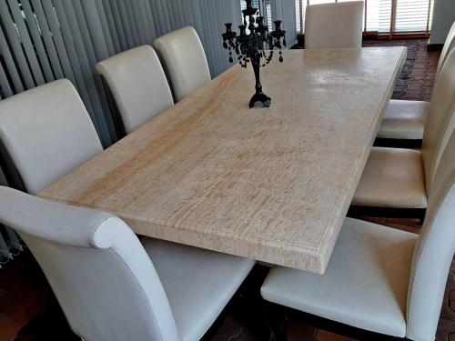 a dining room table with white chairs around it at 6C-Short-term rental allowed-2BRs Downtown Bangkok in Makkasan