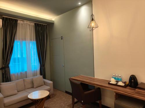 Χώρος καθιστικού στο Asiatic Hotel