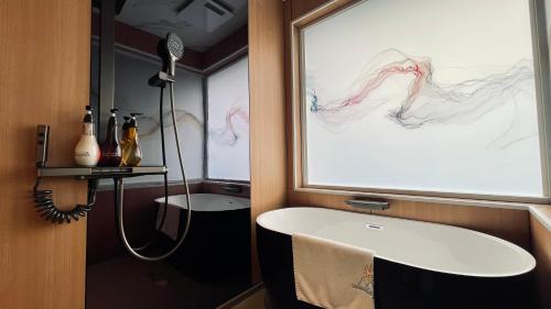 Un baño de Kurobe Sunvalley Hotel