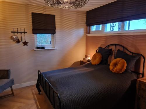 Postel nebo postele na pokoji v ubytování B&B De Schuilplaats