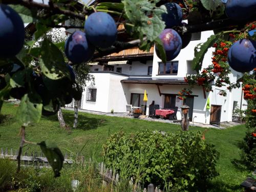 a view of the house from the garden at Schmiedhof in Seefeld in Tirol