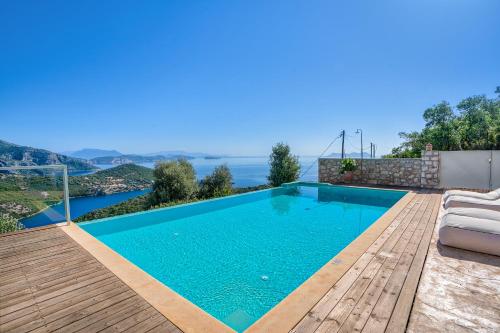 a villa with a swimming pool with a view at Alfresco Villas in Sivota