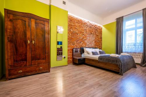 Katil atau katil-katil dalam bilik di Apartament Dworskiego