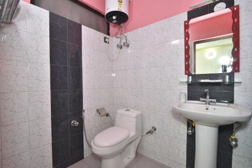 Un baño de Hotel M AND RESORT