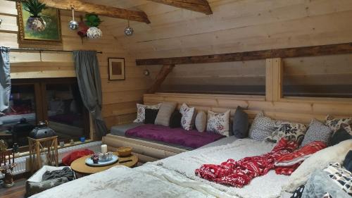 a bedroom with two beds in a room at Apartments Beskydy in Prostřední Bečva