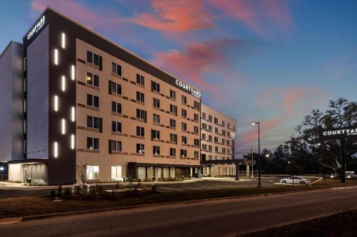 a building on the side of a street at Courtyard by Marriott Pensacola I-10 West in Pensacola
