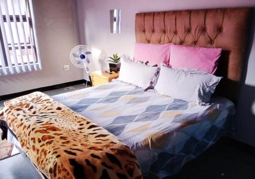 Un ou plusieurs lits dans un hébergement de l'établissement NSK GUEST HOUSE