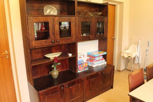 a large wooden cabinet in a living room at Feriested i Tørberget in Tørberget