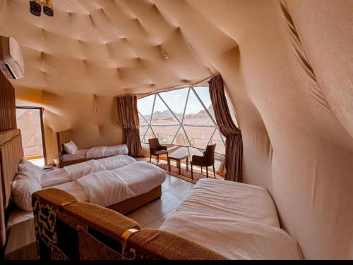 Ένα ή περισσότερα κρεβάτια σε δωμάτιο στο Rose Luxury Camp