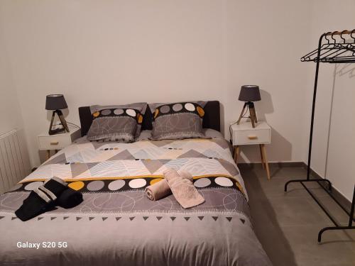 Кровать или кровати в номере Serrimmo - appartement Aude