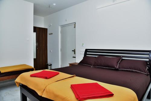 Postel nebo postele na pokoji v ubytování SHREE BALAJI PALACE Homestay