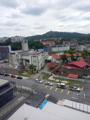 an aerial view of a city with a parking lot at Permata homestay in Karawang