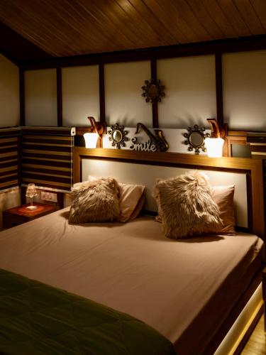 Homestay Podiyansにあるベッド