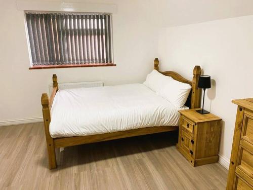 Säng eller sängar i ett rum på Peaceful - 4 bedroom House