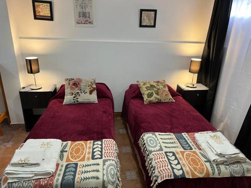 Postel nebo postele na pokoji v ubytování MS Hotel Campos 26