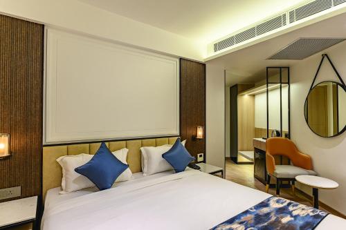 Postel nebo postele na pokoji v ubytování Hotel Eden Serenity