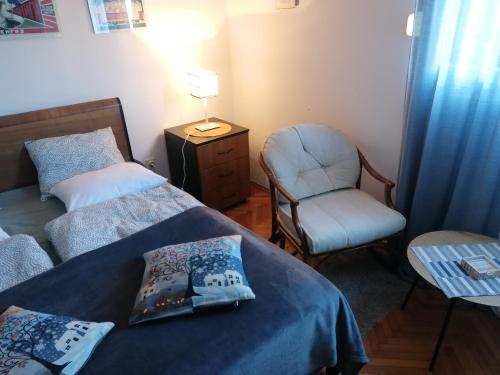 Una cama o camas en una habitación de Bella apartment