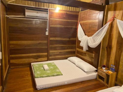 Cama o camas de una habitación en Hồng Gấm Homestay