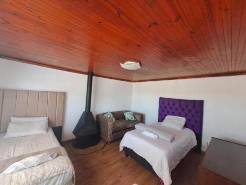 Ένα ή περισσότερα κρεβάτια σε δωμάτιο στο Station Home