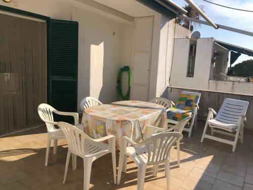En terrasse eller udendørsområde på Casa del Sol Villaggio Tucano