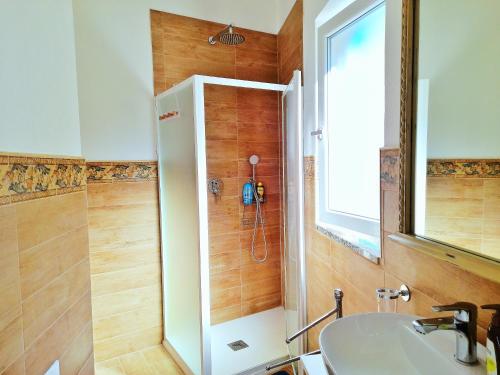 Koupelna v ubytování casa vacanze gioema baunei