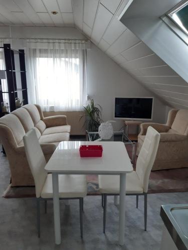 Χώρος καθιστικού στο Ruhiges Einzimmer-Apartment