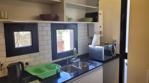 Η κουζίνα ή μικρή κουζίνα στο Depto Edificio Vias Gualeguaychú, excelente
