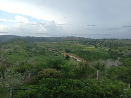 a view of a hill with a road on it at Ali Lewa Tours in Mombasa