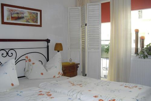 Cama o camas de una habitación en Pension Reuss - Hotel garni