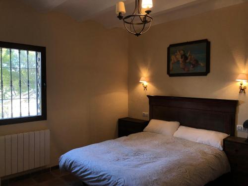 En eller flere senger på et rom på Casa Dehesa San Cristóbal, Jaén