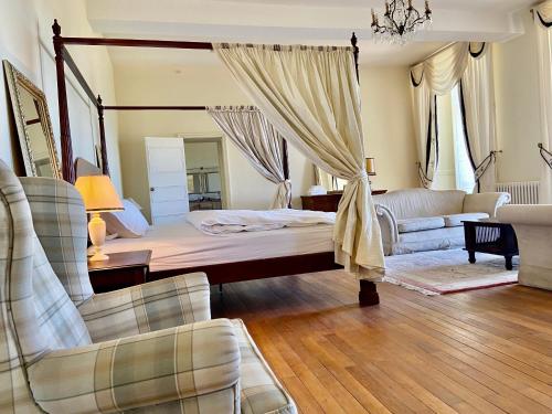 Katil atau katil-katil dalam bilik di Château La Bainerie