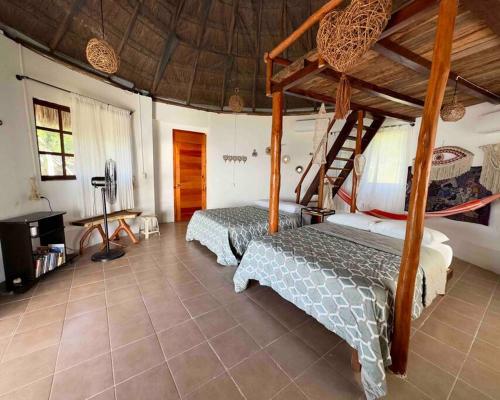 Ένα ή περισσότερα κρεβάτια σε δωμάτιο στο Luigi’s Glamping
